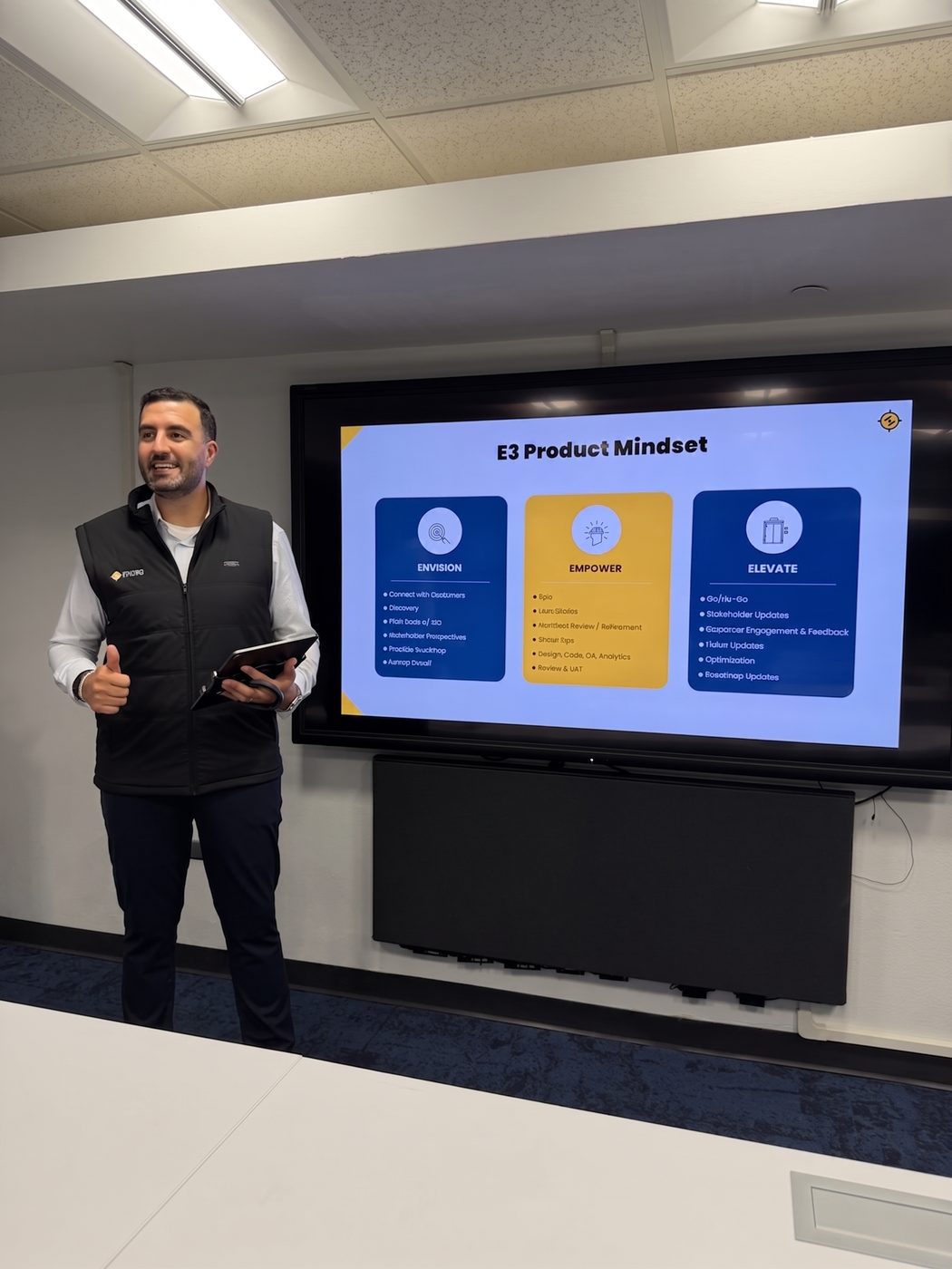 Jason Abdo presenting the E3 Product Mindset to a product team